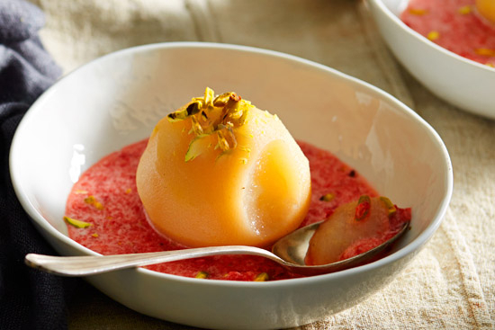 Poached peaches with a strawberry and sparkling clairette sauce