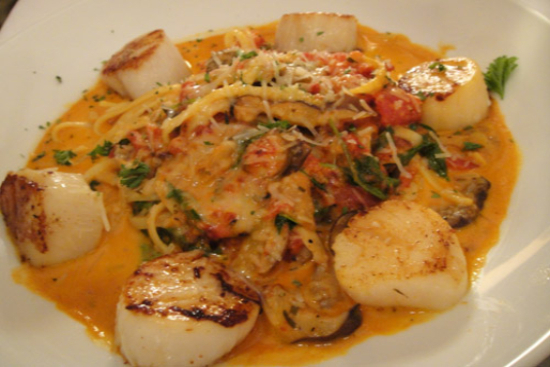 Lemon grass fettuccini with seared shrimp and scallops